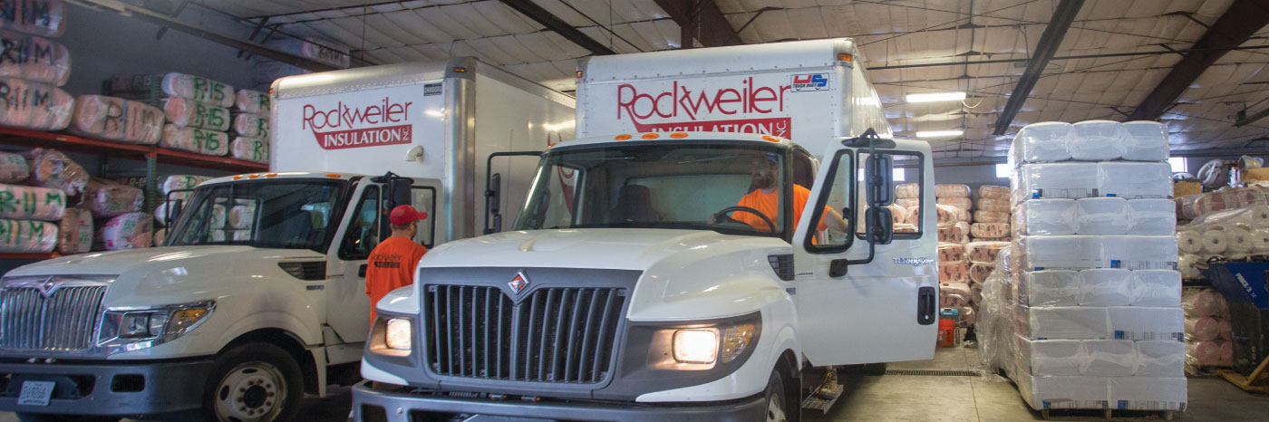 Rockweiler trucks in warehouse.