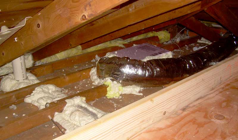 Air sealing insulation insulation, installed in home's attic.
