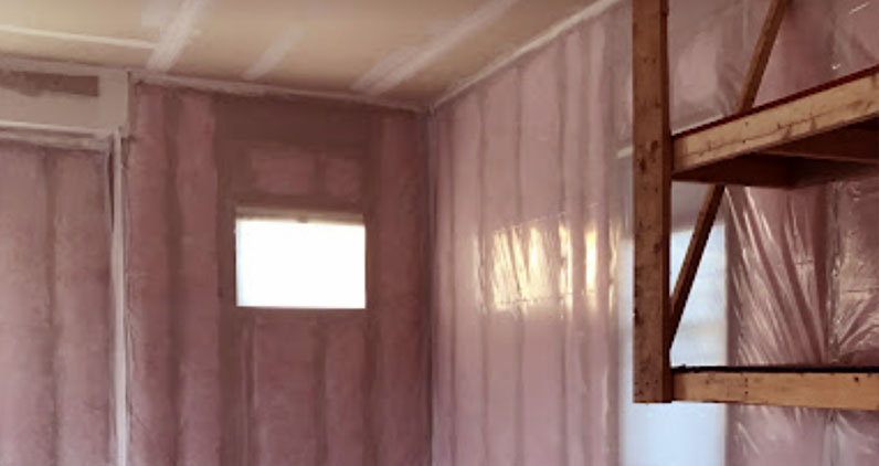 Fiberglass insulation in home's garage walls.