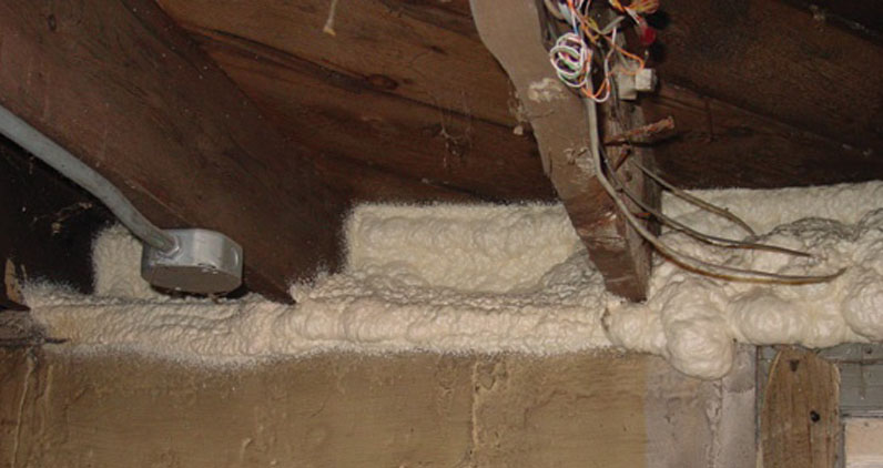 Completed Rockweiler Insulation application of closed-cell spray foam air-sealing the basement box sill and rim joist.