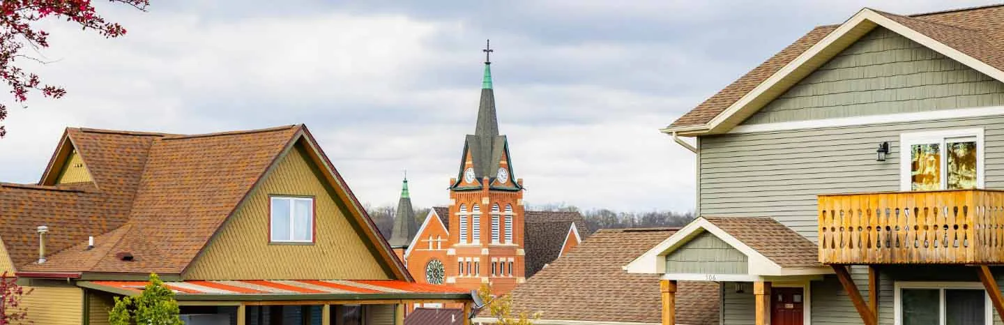 A picturesque view of New Glarus, Wisconsin, featuring charming Swiss-style buildings